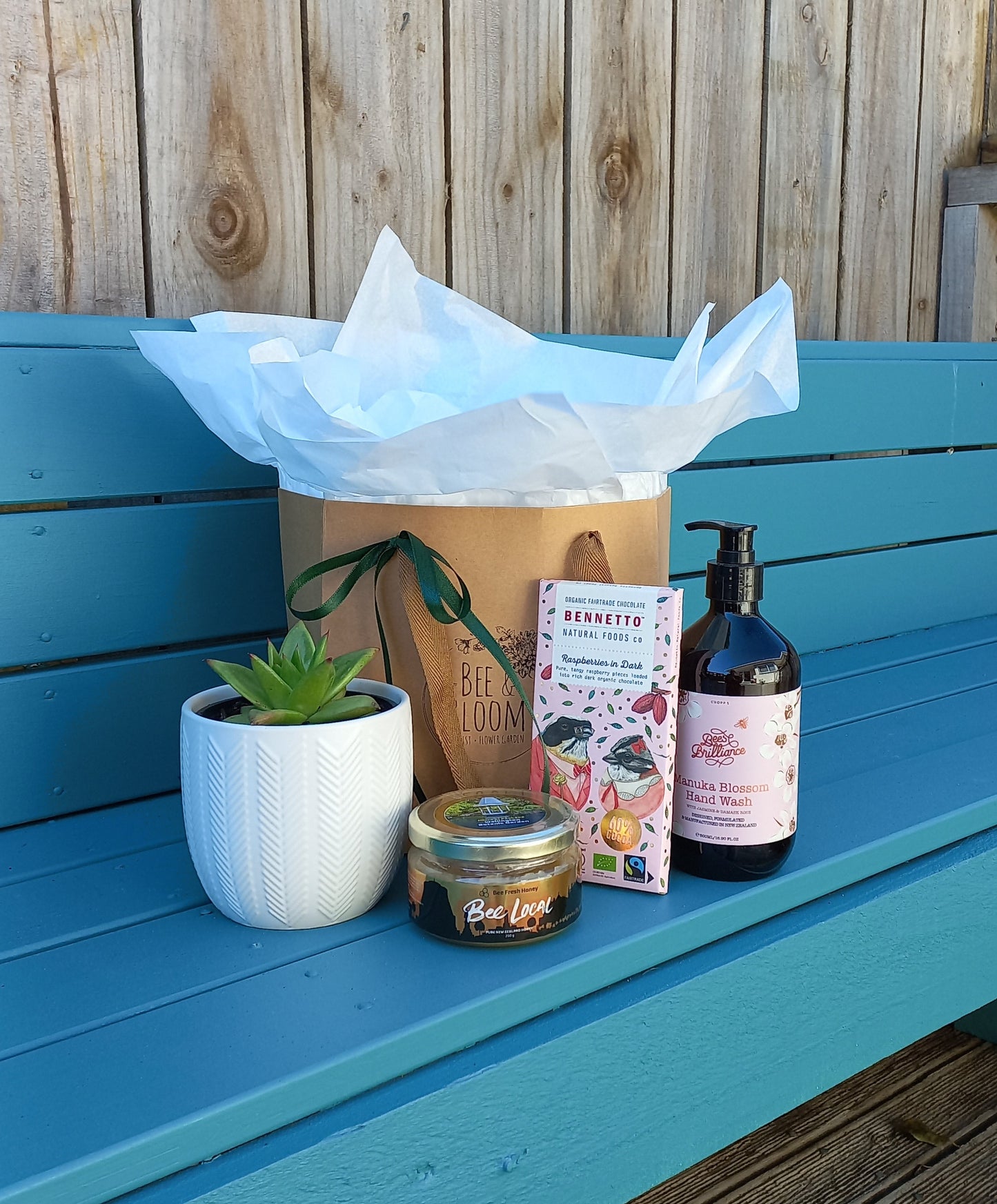 Plant lovers gift box with a plant and special treats