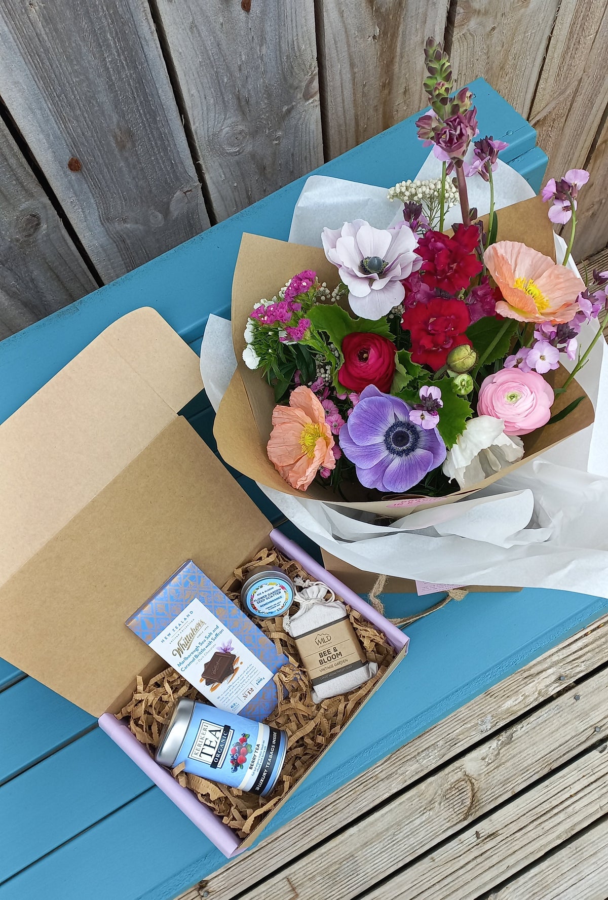 Gift box with fresh flowers