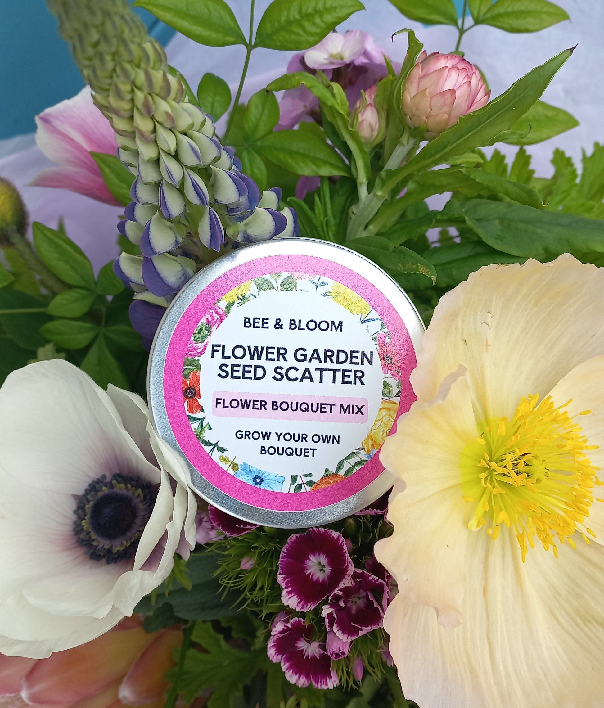 Flower bulb salt scrub with a floral arrangement on a blue background